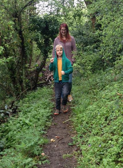Local boy and mum walking through Sladebank Woods